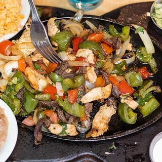 Steak, Shrimp, and Chicken Fajitas